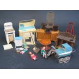 A Selection of Dolls House Furniture and accessories including Tri-ang Spot-On Pram.