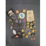 A Selection of Military Badges and Buttons including Middlesex Regiment Cap Badges