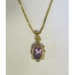 A 9ct Gold and Amethyst Pendant (16mm drop) on 39cm chain, 2.2g