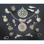A Selection of Silver Jewellery and unmarked white metal jewellery, largest pendant 72mm drop