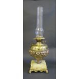 A Brass and Onyx Oil Lamp, 31cm high to burner