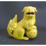 A 19th Century Chinese Imperial Yellow Glazed Foo Dog, 15cm tall