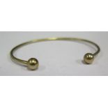 A 9ct Gold Torque Bangle. 3.9g