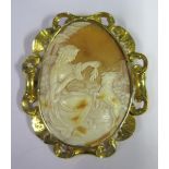 A Nineteenth Century Shell Cameo Brooch decorated with seated lady and goat in a rural setting and