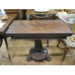 A William IV Rosewood Fold Over Card Table raised on three lion paw feet, 91.5cm