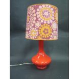 A 1960's Orange Glass Lamp with shade, 48cm overall height