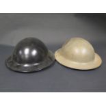 Two British WWII Brodie Helmets