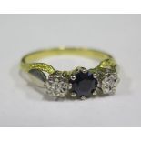 An 18ct Gold, Sapphire and Diamond Three Stone Ring, size R, 3.8g
