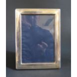 A Modern Sheffield Silver 5.25x3.75" Easel Back Photo Frame