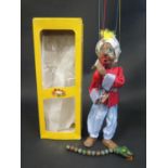 A Pelham Puppet SL24 Snake Charmer in Box with Instructions