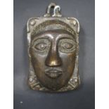 A Small West African Bronze Mask Decoration, 11.5x7cm