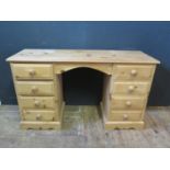 A Waxed Pine Twin Pedestal Dressing Table, 132cm wide