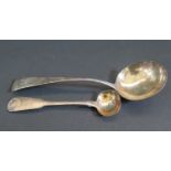 A Scottish George III Silver Salt Spoon Edinburgh 1804 GB? and Georgian silver sauce ladle bearing