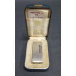 A Silver Dunhill Rollagas Lighter, boxed with papers and working