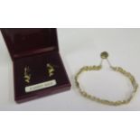 A 9ct Gold Gate Link Bracelet with dolphin decoration and pair of similar pendant earrings, 4.1g
