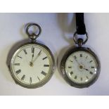 A Ladies Silver Keyless Fob Watch (running) and one other silver fob watch (broken balance wheel)