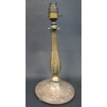 A Very Early Copper and Brass Table Lamp, the base decorated with acanthus leaf and with traces of