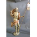 An 18th Century or Earlier Continental Carved Ecclesiastical Figure holding a staff with banner,