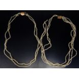 Two Georgian Pearl Necklaces. Four strand c. 37cm long (some strands loose), two strand c. 38cm,