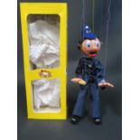 A Pelham Puppet SM6 Policeman in Box with Instructions