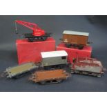 Six Hornby O Gauge No. 1 Crane Truck (boxed), Goods Van (boxed), Tender, Brake Van and Flat Cars