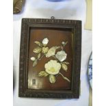A Japanese Meiji Period Ivory and Mother of Pearl Plaque decorated with a blossoming branch and