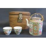 A 19th Century Cantonese Famille Rose Teapot and Bowl in original case