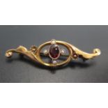 A 9ct Yellow Gold, Garnet and Seed Pearl Brooch in plush case, 44mm, 2g