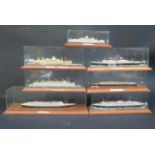 Seven Waterline Cruise Ships etc. in Glass Display Cases