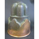A 19th Century Copper Jelly Mould by Trottier, stamped St. John's Coll., 15.5cm high