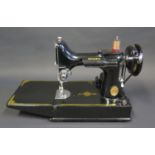 A 1950 Singer Model 221 Featherweight Sewing Machine, no. EF 692905, in orignal case