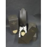 Two Boxed Bottles of 2004 Dom Perignon Champagne