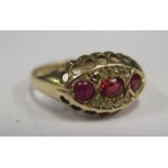 A 9ct Gold and Three Stone Ruby Ring, Chester hallmarks, size N, 2g