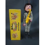 A Pelham Puppet Sax Player (Beatles Inspired) in Box