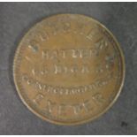 An Advertising Token for BUTCHER HATTER 65 HIGH ST. EXETER by Pope Birmingham, 24mm