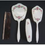 An Adie Brothers Floral Guilloché Enamel Three Part Mirror and Brush Set and a comb