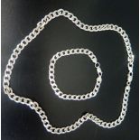 A Sterling Silver Curb Link Necklace (57.5cm) and Bracelet (21cm), 79.4g