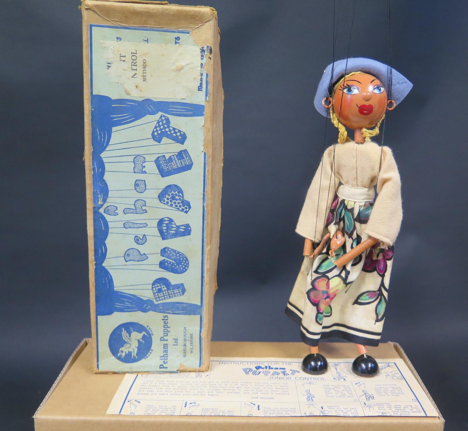 A Pelham Puppet LS Dutch Girl with flat metal hands in Box