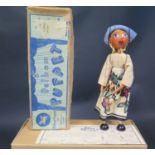 A Pelham Puppet LS Dutch Girl with flat metal hands in Box