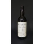 A Bottle of Cossart, Gordon & Cia Madeira Finest Malmsey