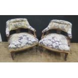 A Pair of Edwardian Upholstered Open Arm Tub Chairs