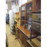 A Victorian Mahogany Glazed Bookcase with cupboard under. Cornice missing