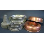 A Selection of Copper and other moulds including two game pie moulds, circular moulds 21cm diam.