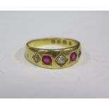 A Victorian 18ct Gold, Ruby and Diamond Five Stone Ring, London 1883, JT, size K.5, 4g
