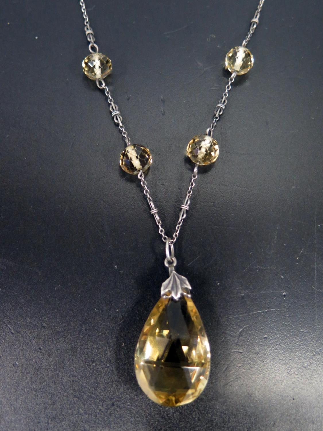 An Arts & Crafts Style Silver and Citrine Mounted Necklace, chain c. 41cm, pendant c. 46mm drop