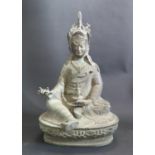 A Bronze Bodhisattva sitting on a lotus blossom, 34cm high