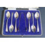 A Cased Set of Six George V Silver Teaspoons with sugar tongs, Birmingham 1920/21, Gorham