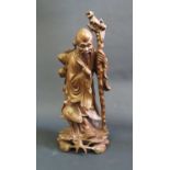 A Chinese Carved Wooden Immortal, 30cm high