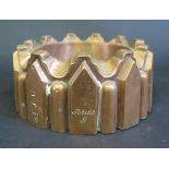 A 19th Century Castellated Copper Jelly Mould from St. John's College Cambridge, stamped St. J.C.