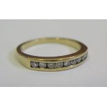 A 9ct Yellow Gold and Diamond Half Eternity Ring, size O, 2.5g